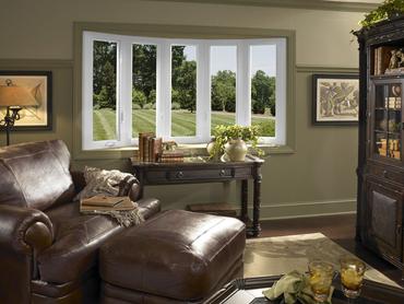 Cozy living room with large bay window.